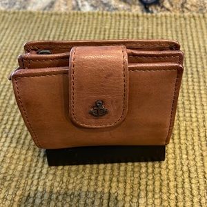 Barbour 2nd leather wallet.  Compartments for bills and zipped area for change.